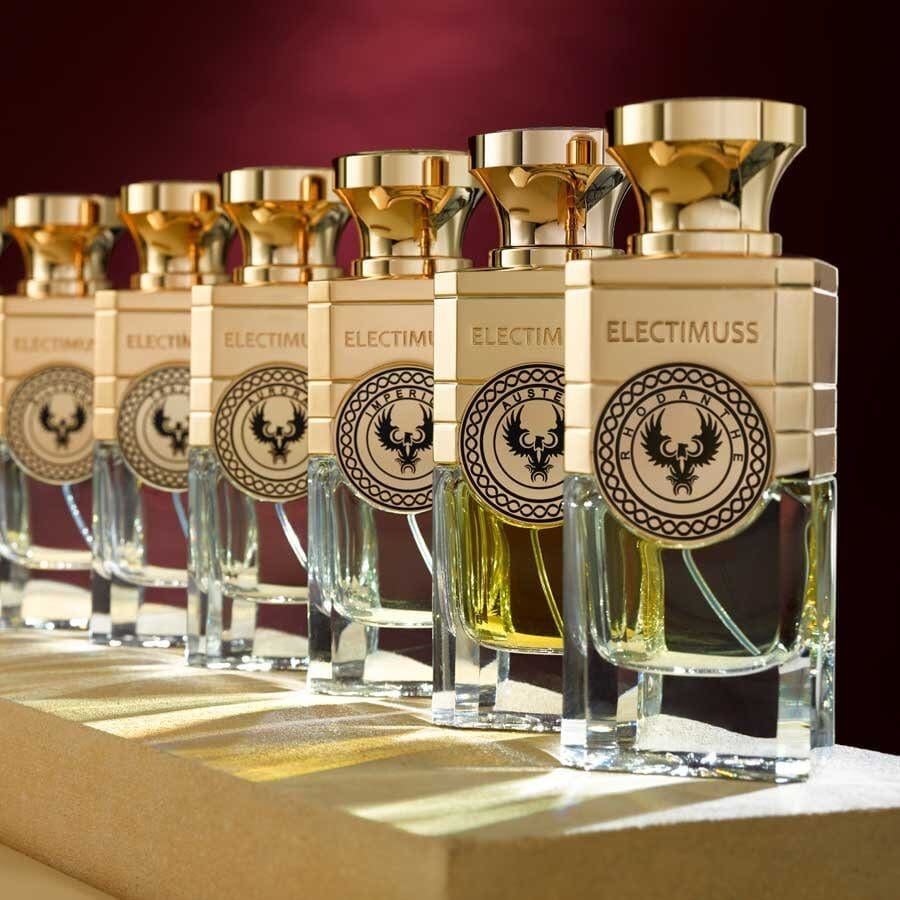 Six Electimuss perfume bottles in a row